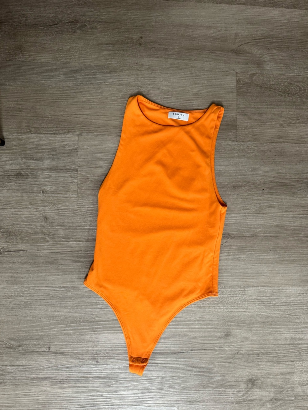 Babaton Orange Sleeveless Ribbed Bodysuit